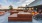 vast deck with social areas and city views