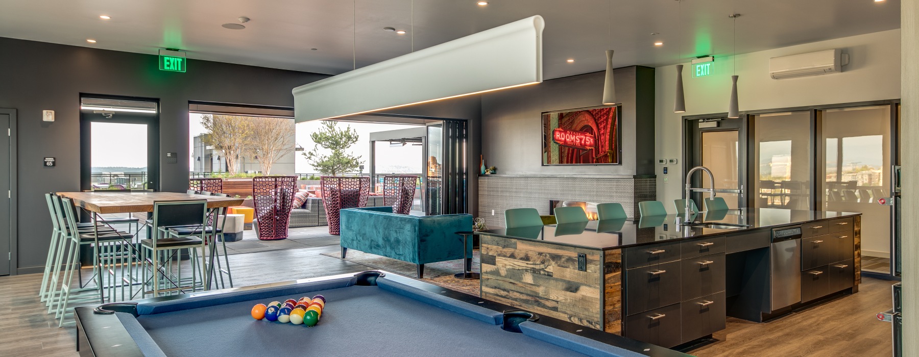 Community lounge with pool table and gathering spaces