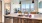 pendant lighting over open kitchen counter facing living room