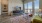 large living room with private balcony access and city views